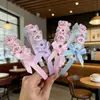 Diadema infantil linda caricatura Sanrio oso fresa accesorios para el cabello estilo coreano nueva diadema para niñas venta al por mayor tienda de dos yuanes