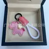 Dinero en el Caballo Cuero de Vaca Creativo Exquisito Casual Regalo de Pareja Bolso Lindo Colgante Llavero de Coche Llavero