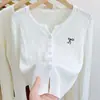 Suéter de punto trenzado de color liso con cuello redondo bordado, cárdigan de punto de una sola fila para mujer otoño/invierno, top de punto de hilo de núcleo