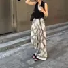 25157 Big Aimei Yiyuan 2025 Verão Novo Estilo Fashion Top Elegante Decote V Sem Mangas Emagrecedor Calça Larga de Perna Larga Tendência Feminina