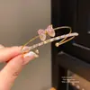 Pulsera Abierta con Lazo de Circonita Estilo Francés, Moderna y Versátil, Pulsera Suave y Elegante, Joyería de Lujo Ligero de Alta Gama al por Mayor