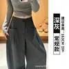 Calça de terno cinza com perna curva para mulheres, nova coleção de outono 2026, calça larga plissada de cintura alta casual, estilosa e sofisticada