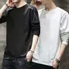 Temporada de primavera y otoño, camiseta lisa de manga larga popular, corte holgado, cuello redondo, camiseta interior para hombre, top simple y versátil