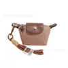 Super Mini Bolsita de Bolso Dragon Fragante 2024 Nuevo Estilo Francés Nylon Cuero Cabezal de Cambio Auriculares Lápiz Labial Llave Bolsita Pequeña Colgante en stock