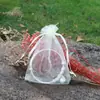Bolsa de hilo de caramelo de color sólido para venta al por mayor, bolsa de embalaje con cordón para joyería, bolsa de organza para regalo, bolsa de malla con cordón para joyería