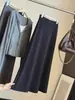 Falda midi lisa de estilo minimalista francés en línea A para mujer, nueva colección de otoño, de cintura alta, corte holgado y favorecedor
