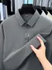 Camiseta de manga larga de alta gama para hombre, primavera/otoño 2026, cuello camisero, polo de retazos, color liso, top versátil estampado