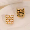 Anillo trenzado de oro con goteo de aceite estilo frío Ins japonés y coreano Diseño retro Anillo de acero de titanio chapado en oro de 18 quilates de alta gama para mujer