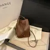 2025 Nova Mini Bolsa de Cordão em Tecido com Design de Nicho para Mulheres Bolsa de Tecido Bolsa para Celular Bolsa de Ombro Crossbody