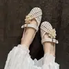 Sandálias Vazadas Tecidas de Bico Redondo 1,5cm Novo Estilo Verão 2026 Bico Redondo Plano Boca Rasa Tira Única Fivela Sapatos Fechados