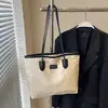 Bolso de gran capacidad para mujer, nuevo bolso de hombro sencillo y versátil de 2024, ideal para estudiantes universitarios y estudiantes de clase alta.