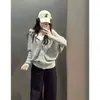 Cardigã de Tricô com Capuz e Mangas Morcego Estilo Coreano Feminino Coleção Outono 2026 Design com Zíper Senso de Design Nicho Versátil Casaco Suéter