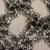 Tejido de punto popular, tejido de malla jacquard de encaje de nailon-algodón para vestidos de mujerPrecio negociable