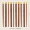 Palillos de palisandro antideslizantes de madera natural cruda sin pintura ni cera estilo nuevo sección por sección estilo de lujo ligero palillos de madera maciza