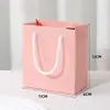 Bolso de mano simple de color liso bolsa de papel caja de joyería a juego bolsa de regalo regular bolsa de embalaje para caja de joyería de pulsera