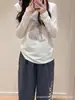 Camiseta estampada de manga larga estilo coreano, corte relajado, para mujer, nueva colección otoño 2026, cuello redondo, corte holgado, top moderno y estilizado