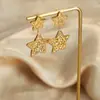 Pendientes con textura de doble capa y diseño de estrella con nicho de personalidad, colgantes de acero de titanio chapados en oro, venta al por mayor
