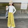 Traje de diseño coreano para niñas Chun Da Tong Primavera y Otoño Nuevo Moda Rayas Cárdigan Superior Pantalones Cropped Conjunto de Dos Piezas