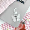 Colgante de Mariposa Wave Point para Bolso Cadena Colgante para Teléfono Móvil Lindo Accesorios de Alto Sentido Llavero Pequeño Regalo Regalo por Lote Espalda