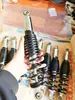 Amortiguador trasero hidráulico de vehículo eléctrico fricción eléctrica presión de aceite pedal universal modelo ciclomotor completo
