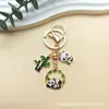 Colgante de etiqueta de panda de dibujos animados estilo chino lindo divertido tesoro nacional aleación de bambú llavero lugar escénico de Chengdu regalo exquisito