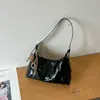 2026 Bolsa de Ombro Única Feminina Cor Sólida Versátil Estilo Retrô Design Popular Toque de Luxo Bolsa Transversal Bolsa de Mão Casual