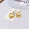 Pendientes de Acero Inoxidable con Forma de Flor de Amor Europeos y Americanos Transfronterizos Geométricos Simples Elegantes Moda Joker Sentido de Alta Gama Nicho
