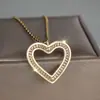 Collar de Corazón Hueco Más Vendido en Amazon Zirconia Cúbica de Diamante Completo Collar Versátil para Mujer