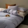 Nuevo juego de cuatro piezas de algodón cepillado engrosado para otoño e invierno, juego de tres piezas cálido de algodón puro bicolor de color liso para ropa de cama de dormitorio de estudiante