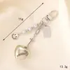 Nuevo llavero con lazo acrílico, colgante con personalidad, colgante para bolso, funda para auriculares, cadena, joyería