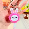2027 Llavero de Peluche de Conejo Lindo Llavero de Bola de Pelo de Cinco Centímetros con Cola Colgante de Promoción en Tierra Venta al por Mayor