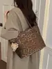 2026 nuevo bolso de hombro tipo tote de gran capacidad, alta calidad, nicho, con estampado de leopardo patchwork de textura mate