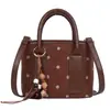 2026 Invierno Otoño Duro Súper Caliente Estampado Leopardo Bolso Cubo para Mujer Retro Bolso de Mano Tipo Cojín Bolso Cruzado Casual de Hombro