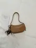 Bolso de Mujer Retro Moderno Sencillo 2026 Nuevo Modelo de Otoño Bolso de Hombro Texturizado Moda de Nicho Bolso Cruzado Versátil