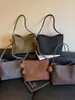 Bolsa Saco Textura Casual Simples Fashionável Tendência Outono 2026 Nova Chegada Bolsa de Grande Capacidade Bolsa de Ombro Estilosa Feminina