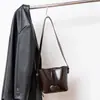 Elegante y versátil bolso tote de un solo hombro para el día a día, bolso de mujer de gran capacidad, nuevo modelo 2026, piel genuina, bolso grande de moda popular