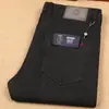 Pantalones casuales de mezclilla para hombre, otoño, cinco bolsillos, grosor medio, algodón, corte recto ajustado, lavado, color liso, tiro medio