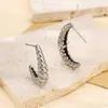 Pendientes de acero inoxidable en forma de U retorcido dorados, accesorios de joyería europeos y americanos, pendientes chapados en oro de 18 quilates, pendientes de explosión de la red
