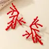 Explosiones Transfronterizas Creativas Chic Estilo Europeo y Americano Metal Ramas de Coral Rojo Pendientes para Mujer de Moda Fotografía Callejera Divertida Oreja