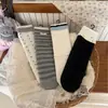 Calcetines versátiles Peijo estilo coreano florales de media pantorrilla, calcetines de encaje con volantes estilo universitario otoño/invierno, calcetines de algodón puro para mujer Zhuji al por mayor