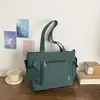 Bolso de hombro versátil de color liso, nuevo para el otoño de 2026, bolso tote de gran capacidad, bolso cruzado para estudiante y para el día a día, transfronterizo