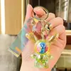 Colgante de llavero de conejo de orejas largas iridiscente de cristal transparente acrílico, decoración para coche y bolso, regalo exquisito de alta gama