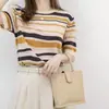 Camiseta de punto de algodón puro de manga corta con cuello redondo y rayas degradadas, nuevo estilo de verano, top sencillo de estilo coreano con bloques de color para mujer