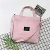 Bolsa de lona atacado de fábrica feminina 2021 Nova moda casual coreana de veludo cotelê estudante bolsa de ombro mensageiro