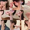 2026 Nuevos Pendientes de Corazón Elegantes y de Moda para Mujer Pinzas para Orejas Versátiles Pendientes de Botón de Nicho de Alta Gama para Mujer Venta al por Mayor