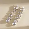 Brincos Redondos Europeus e Americanos de Luxo Leve com Studs de Diamante, Pingente de Gota D'água e Franja, Brincos Personalizados de Alto Padrão para Venda Transfronteiriça, Acessórios de Orelha da Moda de Nicho