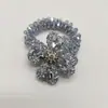 Anillo para el pelo de cristal de trébol de cuatro hojas transfronterizo, cuerda para el pelo de mujer con temperamento, cuerda para el pelo de goma brillante con pedrería, accesorio para el pelo, venta al por mayor