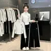 Nuevo Conjunto Deportivo de Primavera y Otoño para Niñas, Chaqueta Elegante de Media Cremallera y Pantalones Anchos a Rayas, Conjunto de Dos Piezas