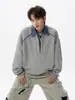 Moletom estilo americano de duas peças falsas com zíper parcial e gola dobrável para homens, marca da moda outono 2026, top casual estilo college de caimento solto para casais