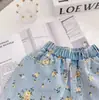 Conjunto Jeans Estilo Coreano para Meninas Verão 2026: Conjunto de Duas Peças: Top Jeans de Manga Curta com Gola Reversível + Shorts Florais